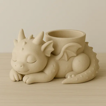 Sleeping Baby Dragon Planter STL – Cute 3D printable succulent pot featuring a sleeping dragon design.